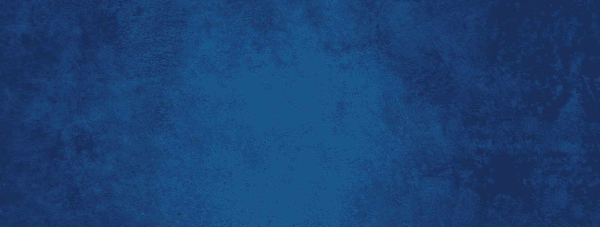 Textured blue background with subtle darker and lighter areas.