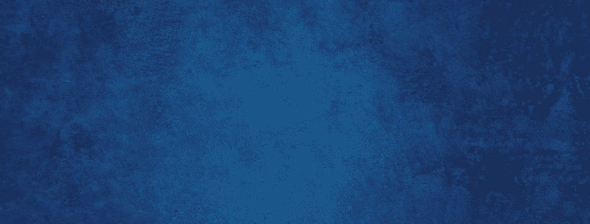 Textured blue background with subtle darker and lighter areas.