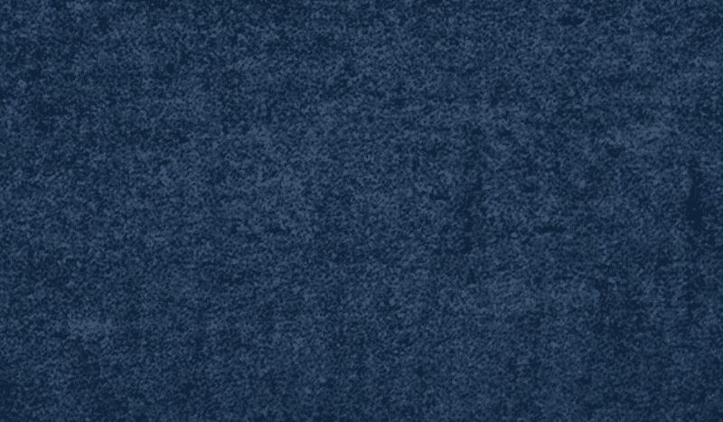 Close-up of dark blue denim fabric texture.